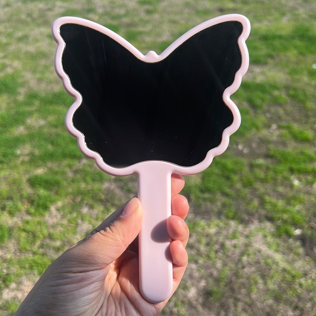 Espejo de mariposa rosa